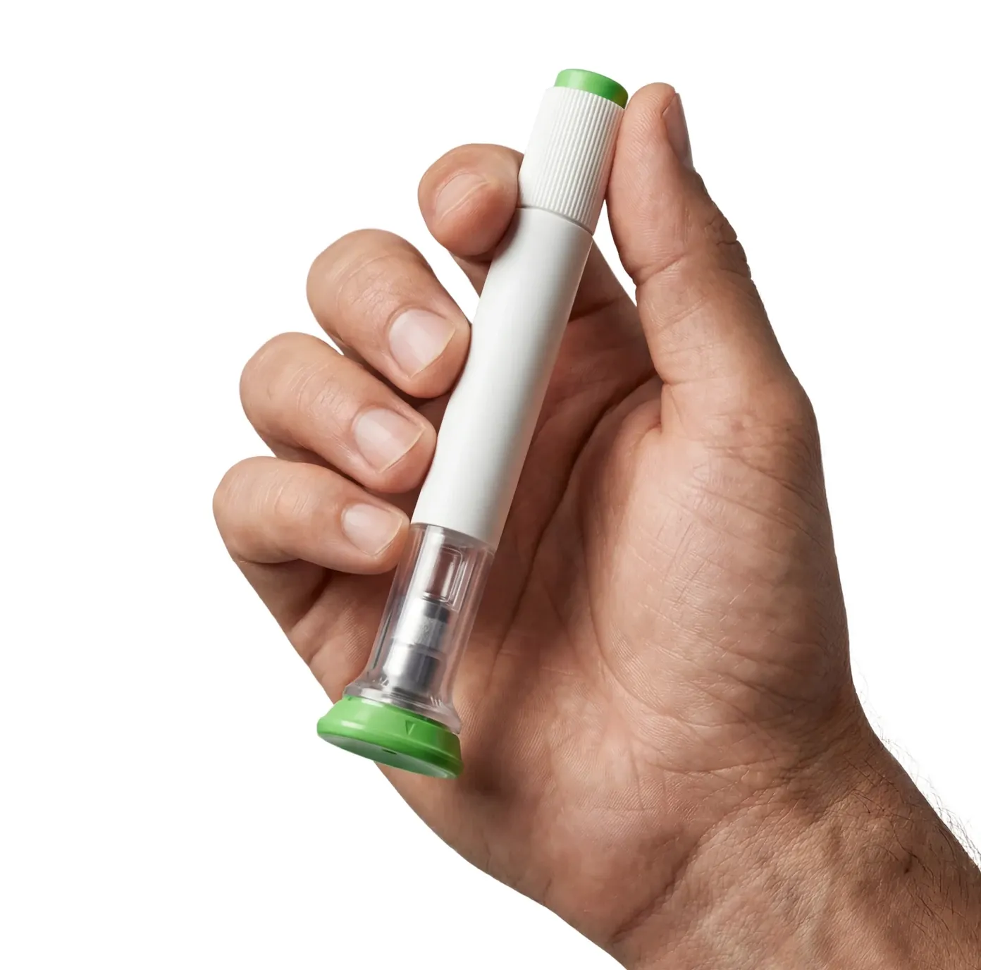 Main d'homme tenant un stylo injecteur